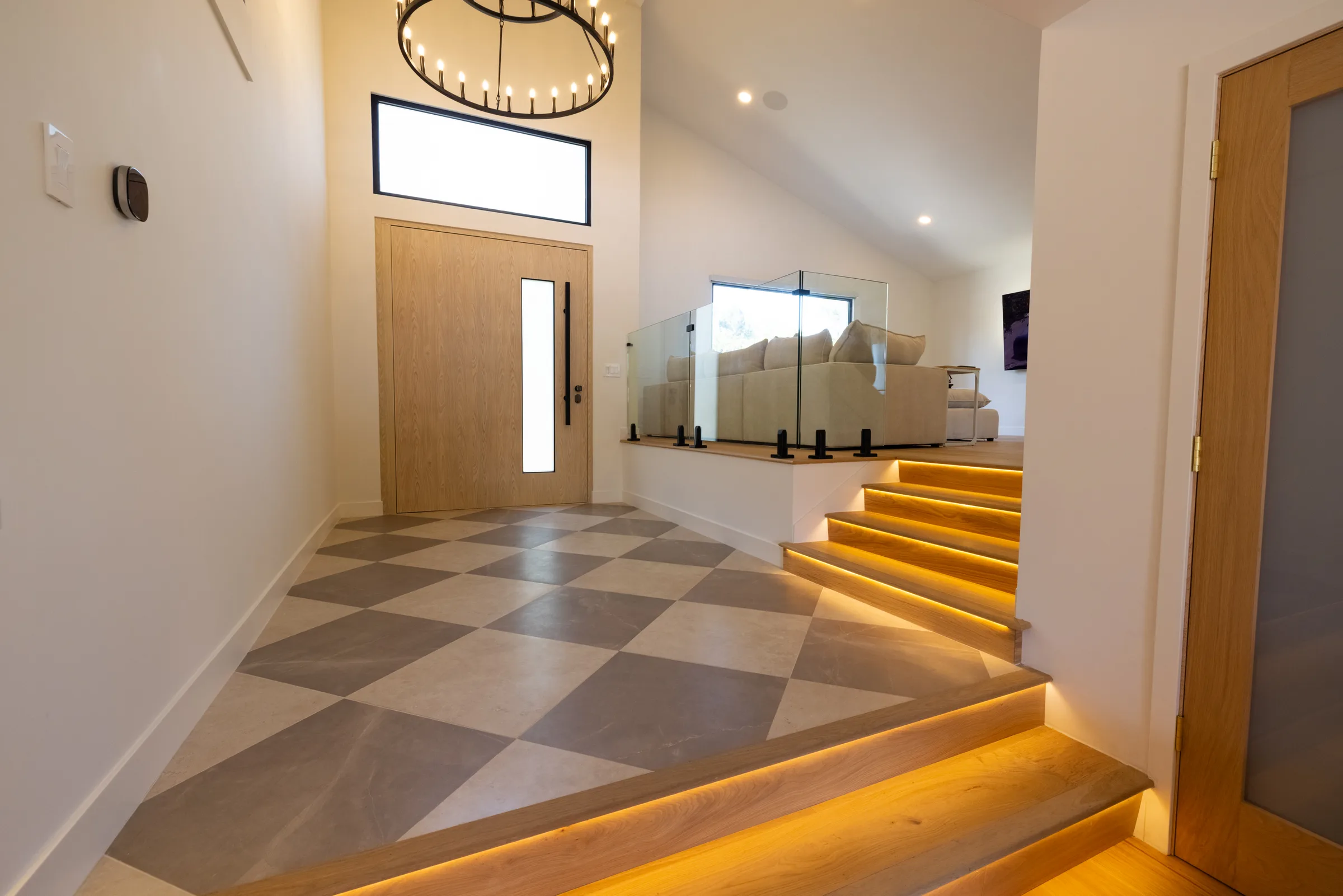Modern custom pivot door in walnut